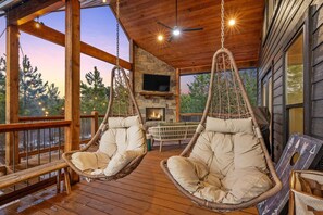 Outdoor deck with comfy swinging chairs