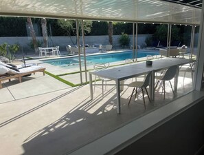 Covered patio, lots of seating for dining and lounging