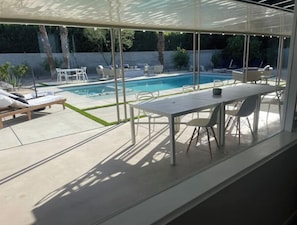 Covered patio, lots of seating for dining and lounging
