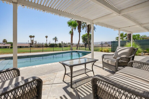 Welcome to this beautiful golf course front home in Palm Desert!