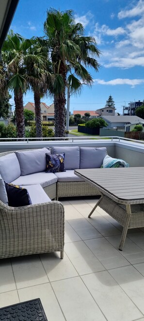 Upstairs deck enjoys sea peeps, unobstructed street views and ultimate comfort