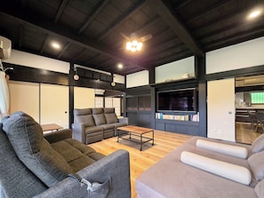 You can relax on the sofa and enjoy watching movies with your family.