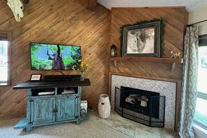 Smart tv and cozy gas fireplace