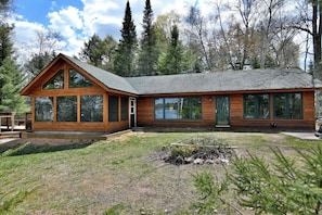 Aunt Alice's Cabin is located near the water with fabulous views.