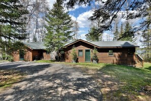 Aunt Alice's is a log cabin located at the water's edge.