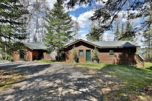 Aunt Alice's is a log cabin located at the water's edge.
