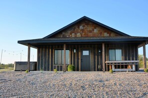 Take a breath of fresh air in a tranquil abode nestled in private land surrounded by natural beauty.