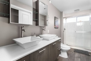 Freshen up each morning and evening in our modern guest bath.