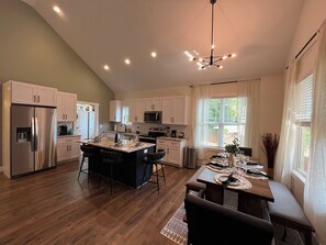 Fully-stocked kitchen and table for 8