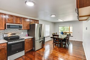 Kitchen & Dining Area | 2-Story House | In-Unit Laundry