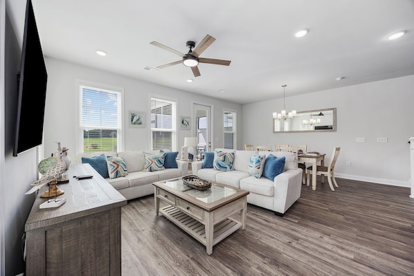 A spacious and well decorated living area where everyone gets to laugh and share memories with