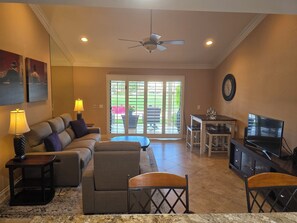 Reclining seating throughout, nice view of golf course. Lovely shutters.