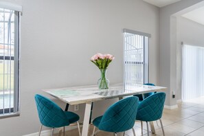 Furniture, Table, Dining Table, Dining Room, Indoors