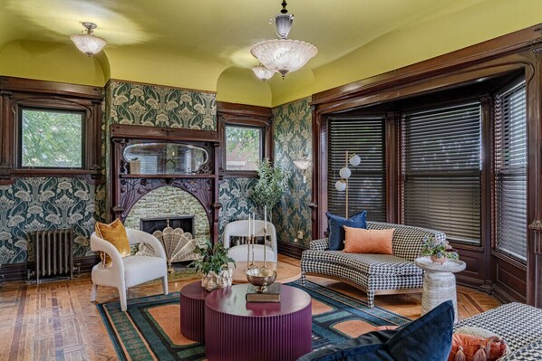 Bright and inviting, this living room is bursting with warmth and charm! #CozyCorner