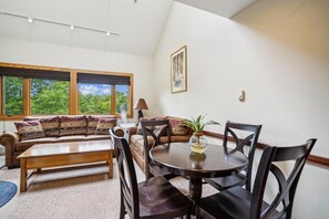 Dining table seats 4 people.  Seats 4, a leaf is available to extend the table