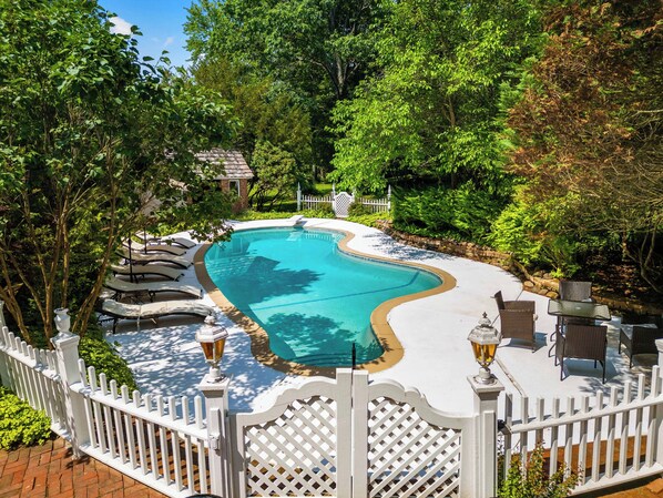 Large private pool with loungers, seating, dining area, fire pit & cabanas 