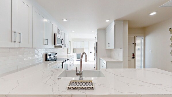 Fully Stocked Kitchen with Custom Cabinetry