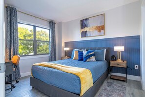 Suite 1 with private bathroom, queen bed, crib, air conditioning, TV, bed linen