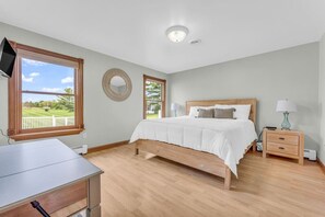 Main floor bedroom with queen bed, walk in closet and full bath attached!