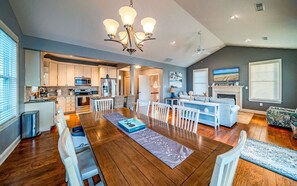 View of the dining area, kitchen and living room
