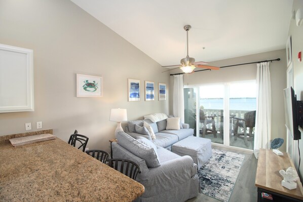 Relax in the comfortable living room and enjoy of gorgeous view of the bay.