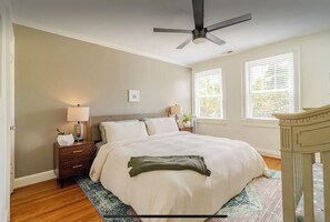 This king bed is elevated by a brand new Thuma bed frame and an organic mattress