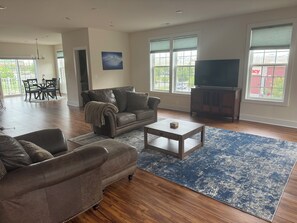 Living room next to kitchen & dinette