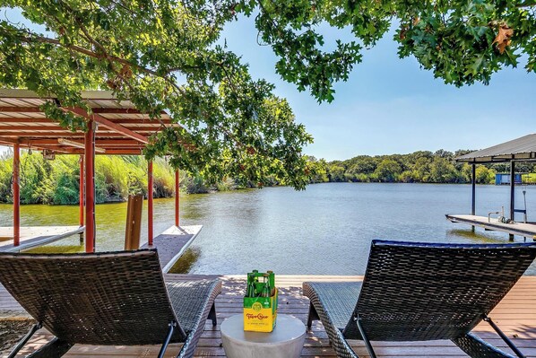 Serenity awaits – enjoy lakefront views while relaxing on this peaceful dock.
