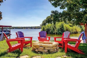 Relax lakeside with the soothing warmth of a crackling fire.