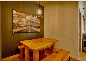 Dining area seats 4.  3 extra island seating stools at kitchen counter