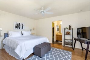 Master bedroom with Cal King bed with streaming TV. Great for lounging.