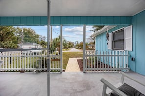 Step out onto the porch and enjoy the fresh air and peaceful neighborhood views.