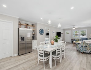 Gather around the dining table for delicious meals and memorable conversations.