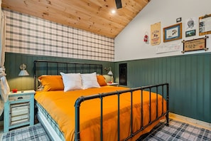Large, bright primary bedroom with a king-sized bed for a restful night's sleep.