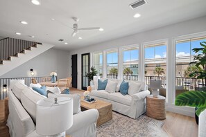 Luxurious Coastal Living Room with Gulf Views and Private Balcony