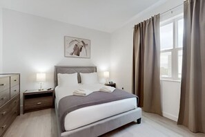 Sleep comfortably on a spacious queen-size bed in this inviting room.