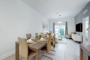Enjoy meals together in the spacious dining area with ample seating.
