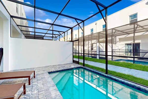 Dive into the fully fenced pool and relax on the sun loungers.