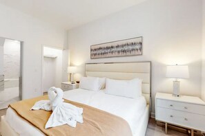 Sleep like royalty in my spacious bedroom with a king-size bed.