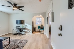 The living room has a bright, open feel