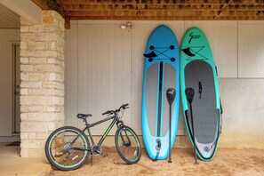 Adventure-ready with bikes and a paddleboard, perfect for exploring.