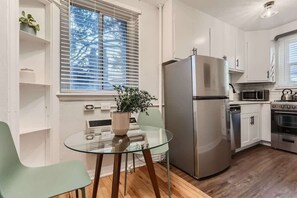 Lots of light in the kitchen dining area from south and west facing windows