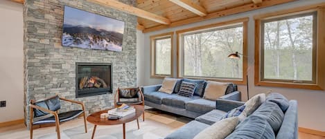 Comfortable living room for relaxing with a fire after a day of adventures