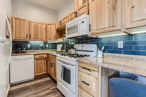 Spacious kitchen with tons of countertop space to cook or bake