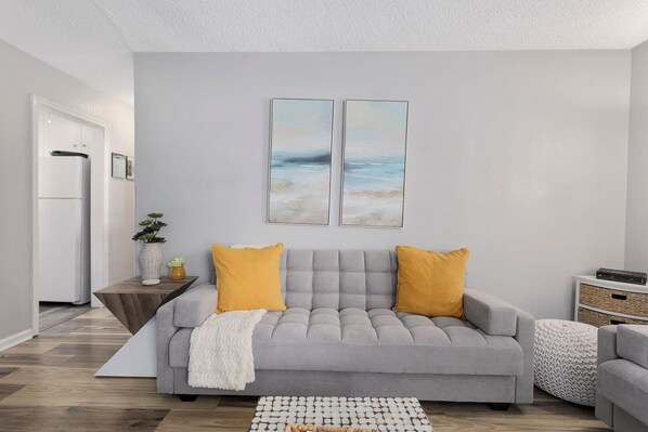 the couch folds out, perfect for your 5th guest!