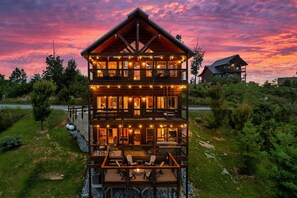 Birds-eye view of our 3-level cabin at dusk.