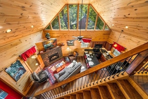 Cozy Up In Nature’s Embrace: Bedroom Above, Views Below!