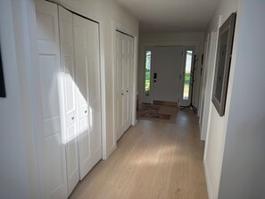 Looking at front door from kitchen