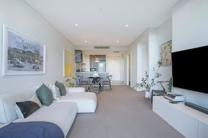 The living room is beautifully appointed as a retreat for couples or small groups.