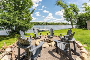 Cozy up around the custom bonfire pit overlooking Big Blake Lake. It's the perfect spot to roast marshmallows, share stories, and gaze at the stars, with a chance to spot the northern lights. Ideal for creating lasting memories by the fire with family and